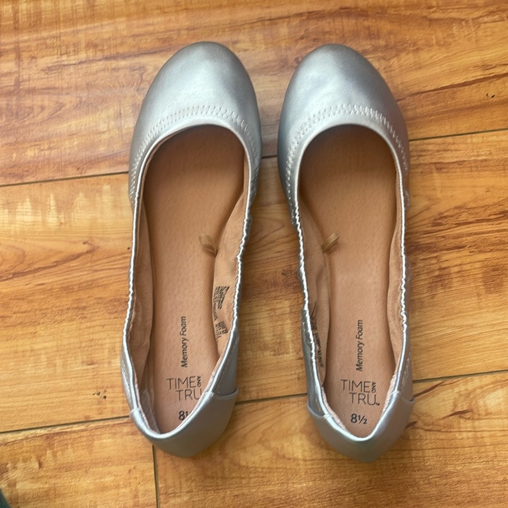 Silver ballet flats.